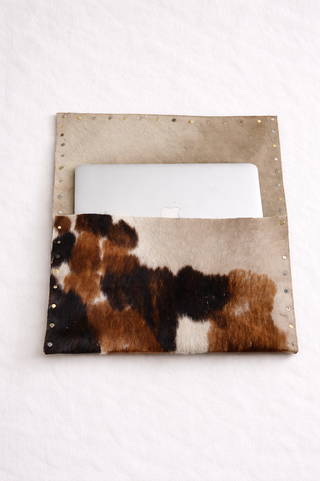 COWHIDE STUDDED COMPUTER SLEEVE